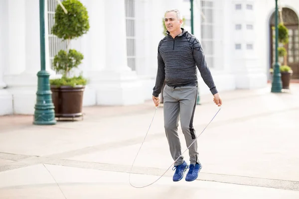 Good Looking Middle Aged Man Jumping Rope Exercising Outdoors City — Stock Photo, Image
