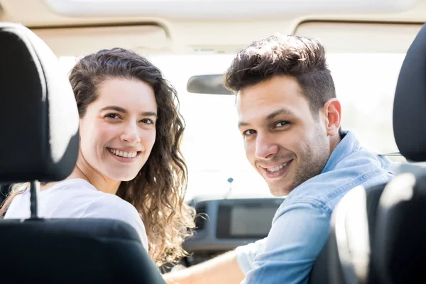 Rear View Woman Sitting Driving Seat Car Her Partner Looking — Stock Photo, Image