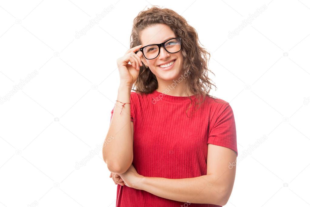 Portrait of a smart young woman with glasses smiling isolated on white background