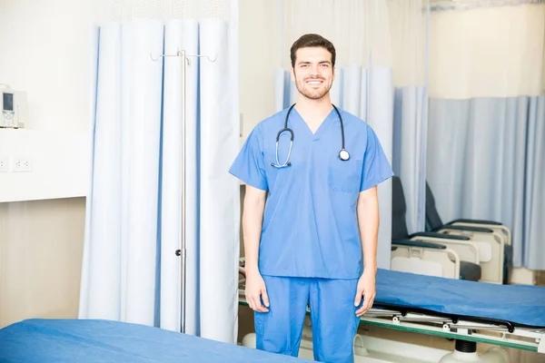 Handsome Hispanic Doctor Wearing Scrubs Standing Hospital Room — Stock Photo, Image