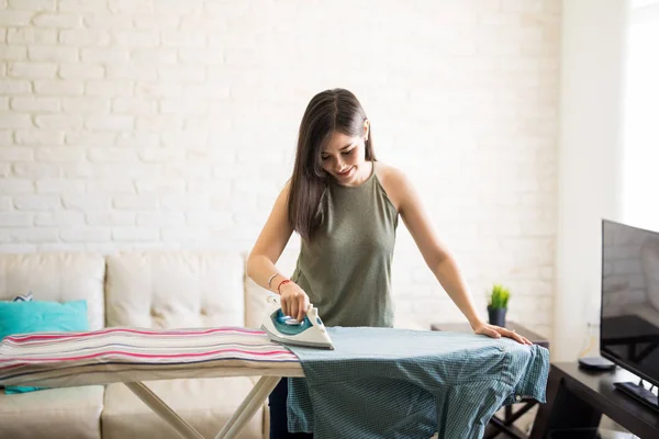Cheerful Young Housewife Wearing Casuals Ironing Male Shirt Ironing Board — Stock Photo, Image