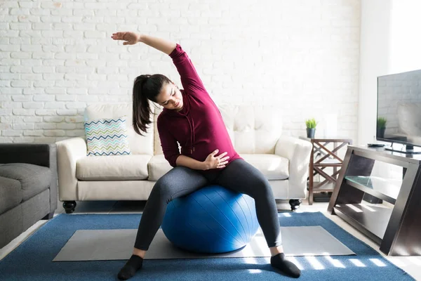 Full Length Gorgeous Expectant Female Sportswear Sitting Stability Ball While — Stock Photo, Image