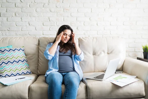 Attractive Expectant Female Suffering Headache While Sitting Sofa Working Home — Stock Photo, Image