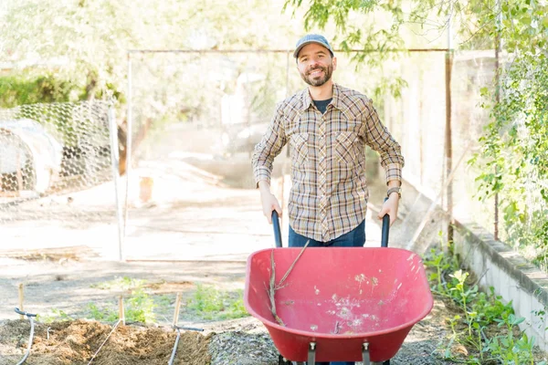 Smiling Hispanic Mid Adult Farmer Standing Wheelbarrow Farm Sunny Day — Stock Photo, Image