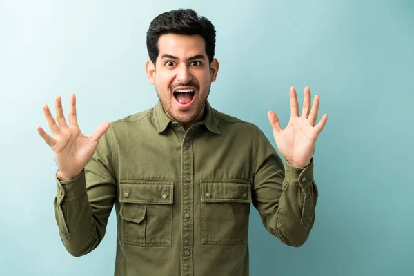 Excited Man Mouth Open Gesturing Blue Background — 图库照片