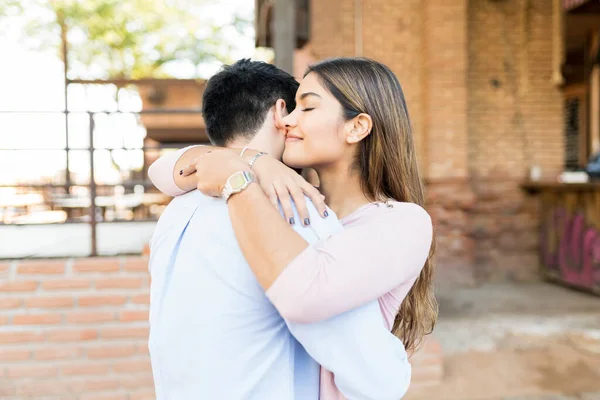 Closeup Of Smiling Boyfriend And Girlfriend Standing Face To Face