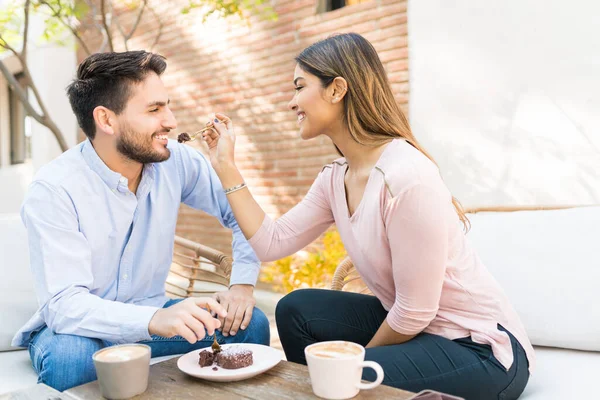 Happy Hispanic Young Woman Feeding Dessert Boyfriend Cafe — 스톡 사진