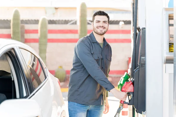 Portrait Smiling Male Staff Holding Fuel Pump Gas Station — 图库照片