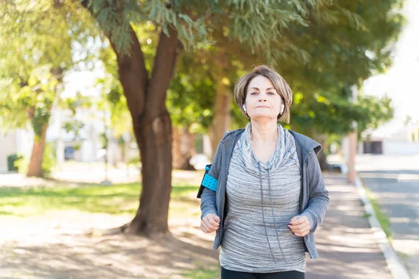 Retired Fit Senior Woman Jogging Sidewalk City — Stock Photo, Image