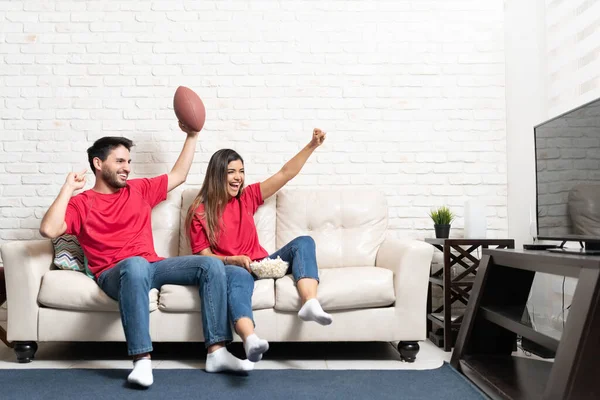 Happy Latin Boyfriend Girlfriend Watching American Football Match Home — Stock Photo, Image