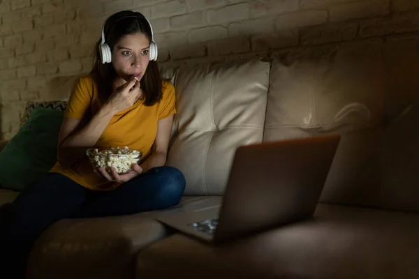 Shocked Woman Watching Suspenseful Movie Laptop Night While Sitting Couch — Stock Photo, Image