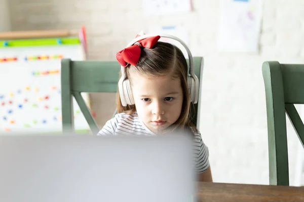 Closeup Pretty Little Girl Using Laptop Computer Headphones Home Looking — Stock Photo, Image