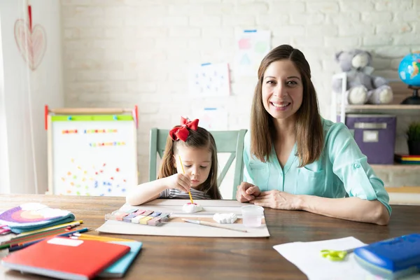 Pretty Caucasian Mother Doing Some School Activities Home Painting Plaster — Stock Photo, Image