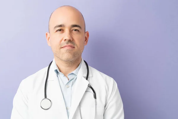 Good Looking Male Doctor His 30S Standing Purple Background Studio — Stock Photo, Image