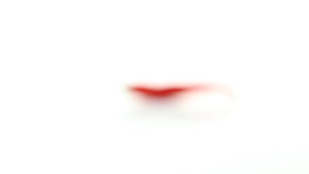Sebuah buram untuk menembak tajam dari cabai merah tunggal pada latar belakang putih — Stok Video