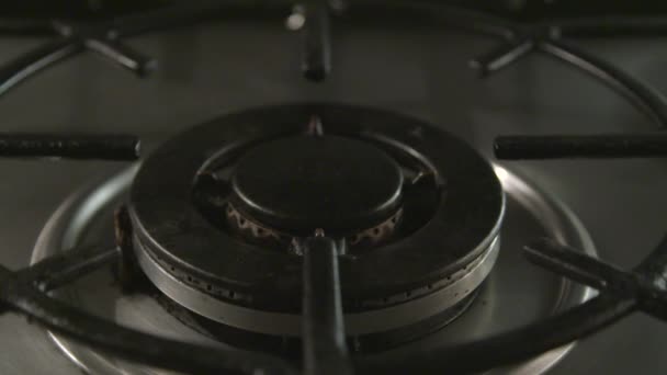 Slow motion clip of a gas hob being lit — Stock Video