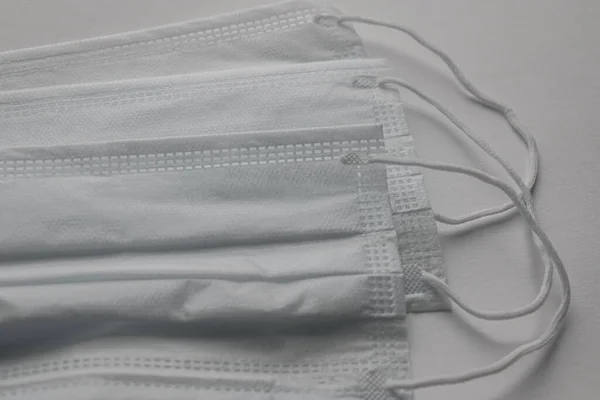 White medical mask. Face mask protection against pollution, virus, flu and coronavirus. Health care and surgical concept