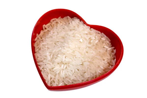 Kalp şeklinde bir kapta beyaz pirinç.