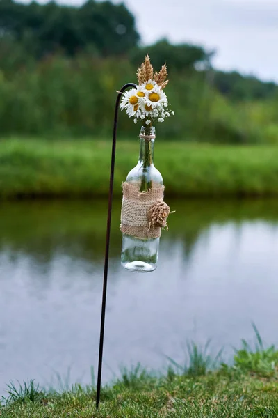 Festively decorated empty wine bottle