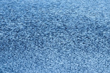 Mavi Tonlu Su Dalgaları Arka plan Olarak Yüzeyde. Dalgalı suyun dokusu