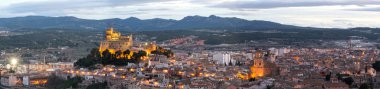 Panorama of Caravaca De La Cruz cityscape and castle, Pilgrimage site near Murcia, in Spain. One of the 5 holy cities in the world. clipart