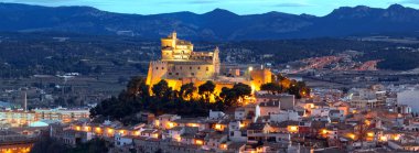 Panorama of Caravaca De La Cruz cityscape and castle, Pilgrimage site near Murcia, in Spain. One of the 5 holy cities in the world clipart
