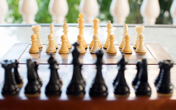 Chess board set up and ready to play. Narrow depth of field.