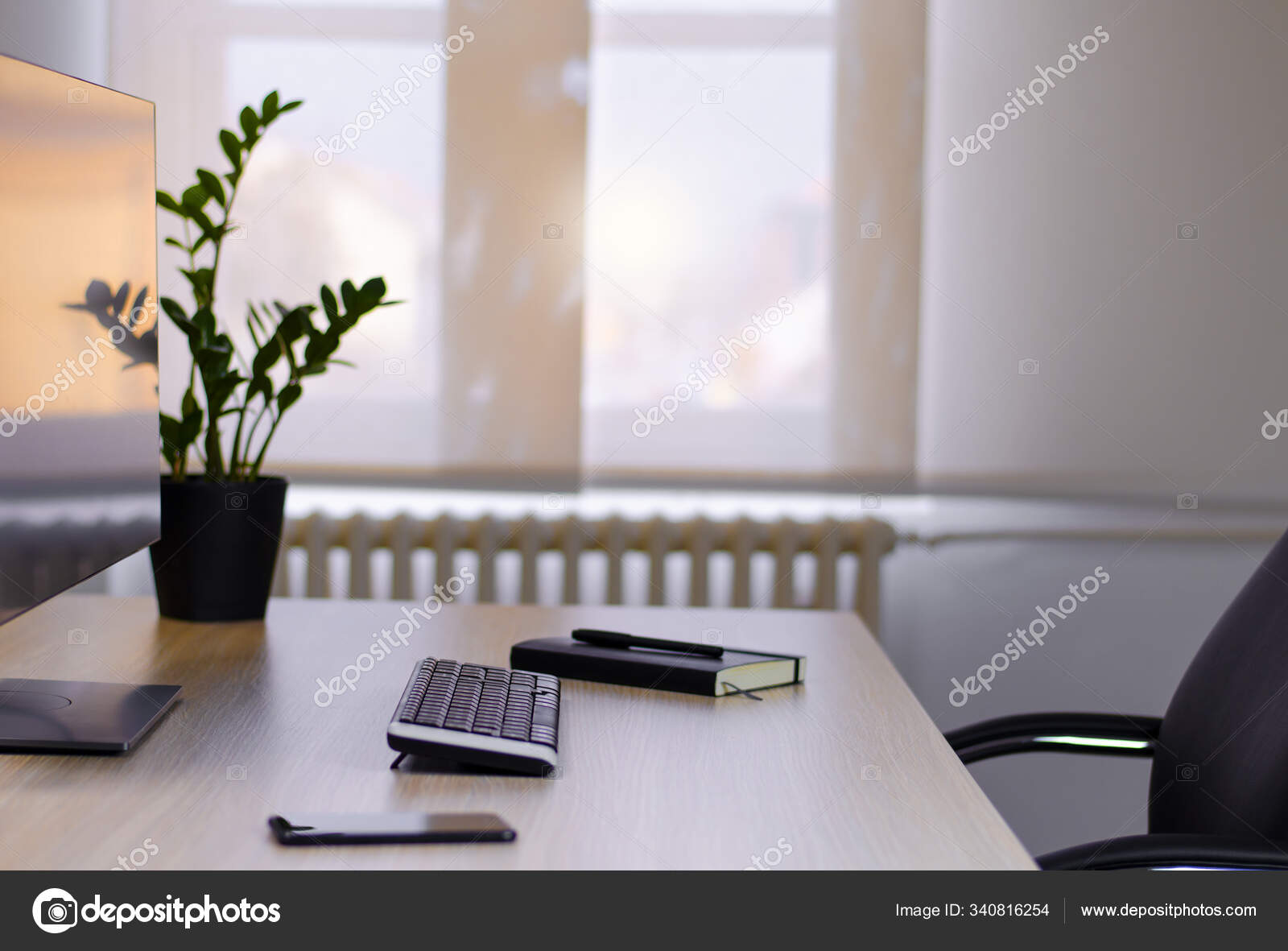 Nice And Neat Office Work Place By The Window Stock Photo