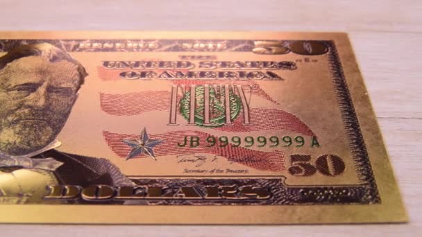 Golden Fifty Dollar Bill Very Close Camera Travels Macro Shot — Stockvideo