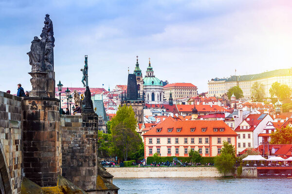 Panoramic view of famous Prague historical sights and tourists on famous Charles bridge , Czech Republic