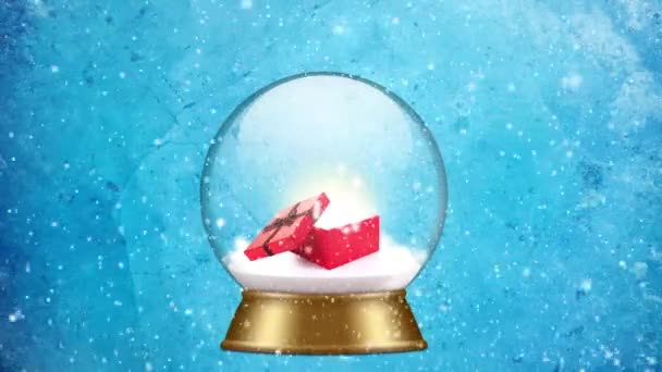 Snow globe with gift box — Stock Video