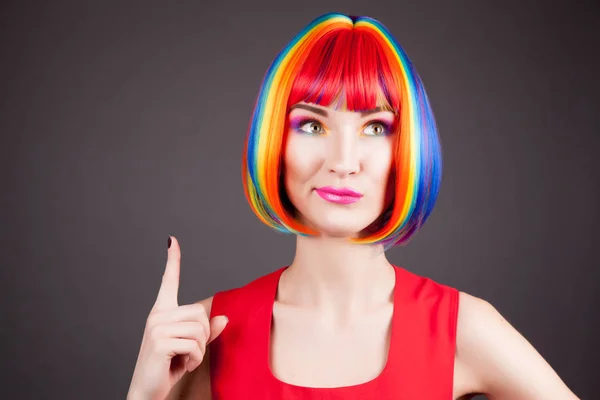 Beautiful woman wearing colorful wig — Stock Photo, Image