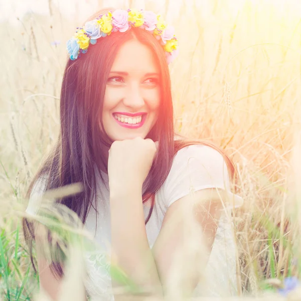 Woman wearing blue and yellow wreath — Stock Photo, Image