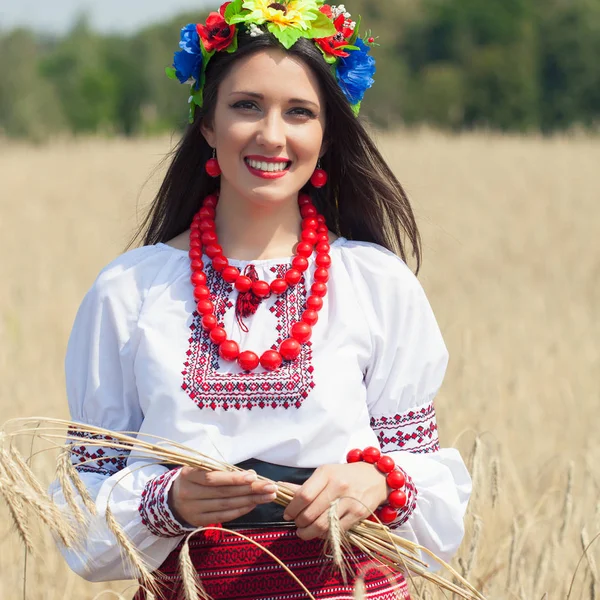 woman wearing national ukrainian clothes