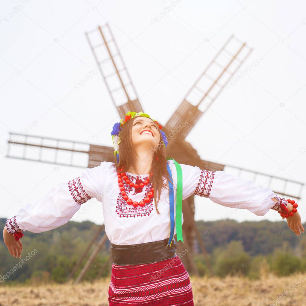 woman wearing national ukrainian clothes