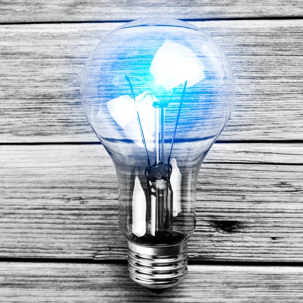 Bulb on the brown  background — Stock Photo, Image