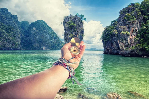 Thailand James Bond stone Island, Phang Nga and hand with compass