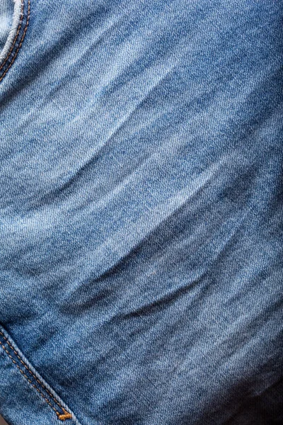 牛仔裤的背景 斜纹棉布与时装设计的接缝 — 图库照片