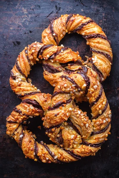 Homemade pretzel with chocolate and crunchy almonds