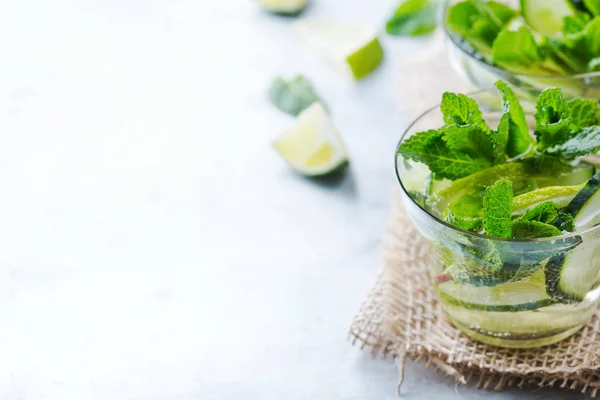 Cucumber lime mint fresh infused water detox drink cocktail lemonade — Stock Photo, Image