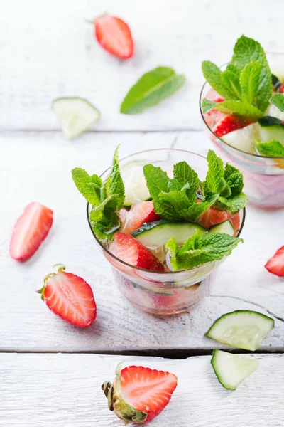 Cucumber strawberry mint fresh infused water detox drink cocktail lemonade — Stock Photo, Image