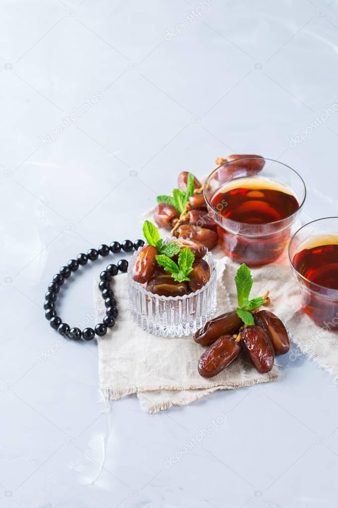 Ramadan ramazan kareem. Traditional arabic tea with mint and dates