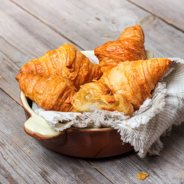 Fresh croissants on a table for breakfast — Stock Photo, Image