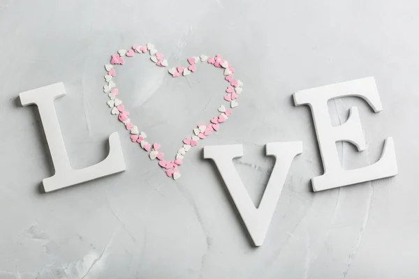 Walentynki wakacje słowo tekst miłość różowy serce — Zdjęcie stockowe