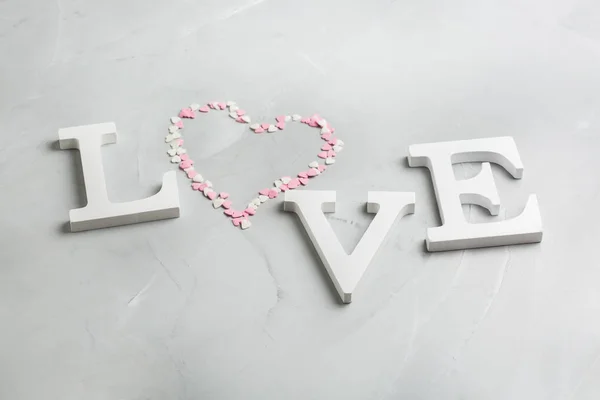 Walentynki wakacje słowo tekst miłość różowy serce — Zdjęcie stockowe