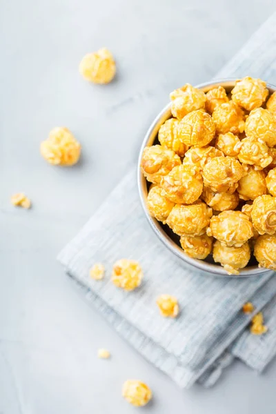 Sweet caramel popcorn for party or cinema at home