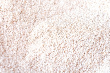 Arka plan olarak beyaz keten tohumu.