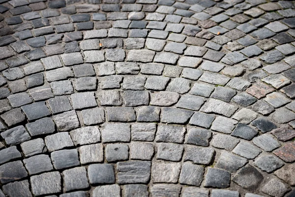 Old cobblestone road in city of Europe — Stock Photo, Image