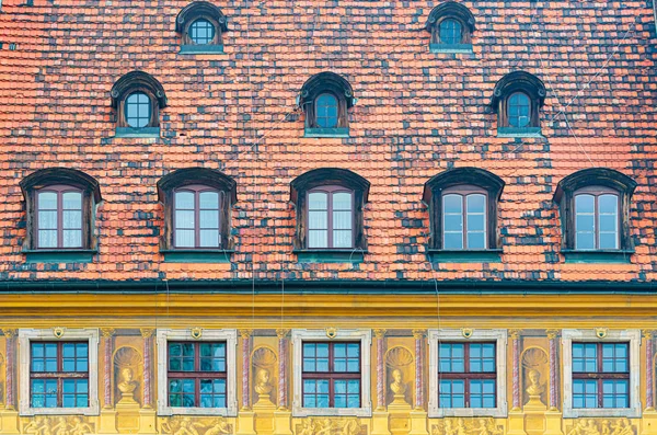 Tiled house roof with window in Wroclaw, Poland — Stok fotoğraf