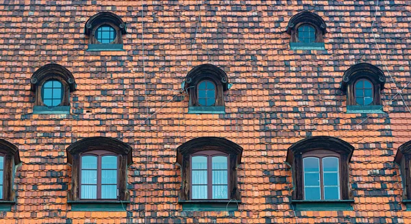 Tiled house roof with window in Wroclaw, Poland — Stock Photo, Image